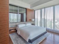 Grand Hyatt Manilaにあるベッド
