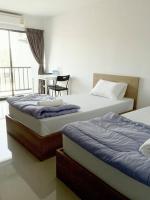 Promsook Apartmentにあるベッド