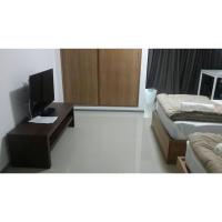 Promsook Apartmentにあるベッド