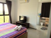 Promsook Apartmentにあるベッド
