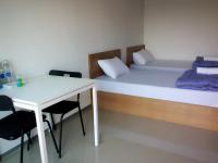 Promsook Apartmentにあるベッド