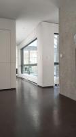 an empty room with white walls and a large window at Maginifique villa d&#39;architecte sur les bords de Marne tout près de Paris in Le Perreux-Sur-Marne