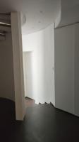 an empty room with white walls and a white pillar at Maginifique villa d&#39;architecte sur les bords de Marne tout près de Paris in Le Perreux-Sur-Marne