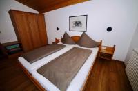 Łóżko lub łóżka w pokoju w obiekcie Apartment Krabacher