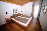 Łóżko lub łóżka w pokoju w obiekcie Apartment Krabacher