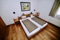 Łóżko lub łóżka w pokoju w obiekcie Apartment Krabacher