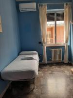 Posteľ alebo postele v izbe v ubytovaní Casa vacanze Omero 2