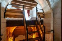 Palanda nebo palandy na pokoji v ubytování Cappadocia Snora Cave