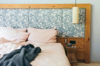 Postel nebo postele na pokoji v ubytování Boutique Hotel Das Rivus