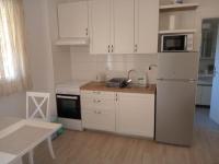 Kuchyň nebo kuchyňský kout v ubytování Apartments Janjac