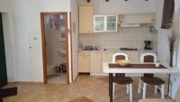 Kuchyň nebo kuchyňský kout v ubytování Apartments Janjac