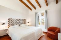 A bed or beds in a room at Agroturismo Son Triay