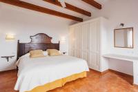 A bed or beds in a room at Agroturismo Son Triay
