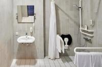 a bathroom with a sink and a shower at B&amp;B Hotel Heidelberg in Heidelberg