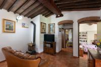Televízia a/alebo spoločenská miestnosť v ubytovaní Villa Le Vigne