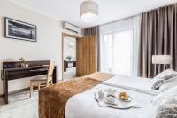 Posteľ alebo postele v izbe v ubytovaní Mercure Wiazowna Brant
