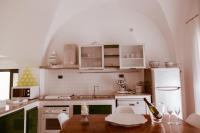 A kitchen or kitchenette at Terrazza Diomede- Manfredi Homes & Villas