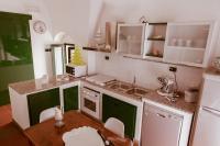A kitchen or kitchenette at Terrazza Diomede- Manfredi Homes & Villas