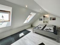 Posteľ alebo postele v izbe v ubytovaní Eklektika Apartman Balatonalmádi