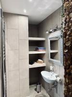 Kúpeľňa v ubytovaní Eklektika Apartman Balatonalmádi