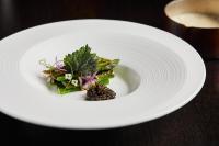 um prato branco com alguma comida na mesa em Grays Court Hotel em York