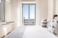 Postel nebo postele na pokoji v ubytování Villa Olivia Mykonos