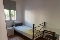 Posteľ alebo postele v izbe v ubytovaní metaxas house