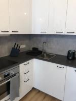 Kuchyň nebo kuchyňský kout v ubytování Andrews Cosy Apartment