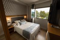 Postel nebo postele na pokoji v ubytování Hotel Montedobra