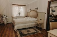 Postel nebo postele na pokoji v ubytování Oławian Hotel
