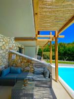 The swimming pool at or close to Koumaros Aparthotel