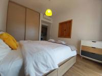 Postel nebo postele na pokoji v ubytování Palm Beach Apartment 26