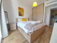 Postel nebo postele na pokoji v ubytování Palm Beach Apartment 26