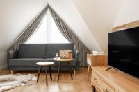 Televízia a/alebo spoločenská miestnosť v ubytovaní Willa Mak Residence - sauna, centrum