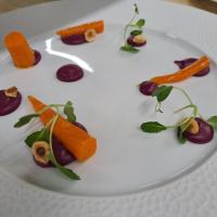 a plate of food with carrots and beets on it at Chateau Le Prieuré Saumur - La Maison Younan in Chènehutte-les-Tuffeaux
