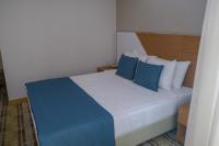 Postel nebo postele na pokoji v ubytování Bulvar Hotel