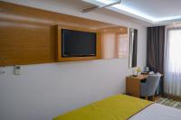 Postel nebo postele na pokoji v ubytování Bulvar Hotel