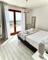 Posteľ alebo postele v izbe v ubytovaní Cape House