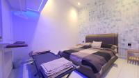 A Place Like Home Landed House Kuala Lumpurにあるベッド