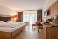 Postel nebo postele na pokoji v ubytování Hotel Sonnenhügel