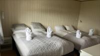 Postel nebo postele na pokoji v ubytování Storfossen Hostel