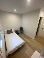 A bed or beds in a room at Habitaciones Arrisal