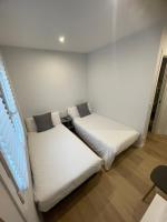 A bed or beds in a room at Habitaciones Arrisal