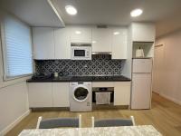 A kitchen or kitchenette at Habitaciones Arrisal