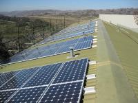 an array of solar panels on the roof of a building at Sundeck Hotel in Perisher Valley