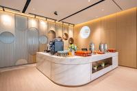 a lobby with a counter in a restaurant at EVEN Hotels Shanghai Expo by IHG in Shanghai