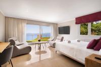 TV a/nebo společenská místnost v ubytování Villa Luna Suites