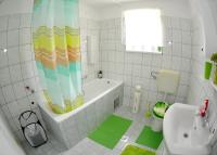 Kúpeľňa v ubytovaní Apartments Žugec