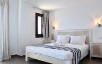 Łóżko lub łóżka w pokoju w obiekcie Hotel Manthos Blue