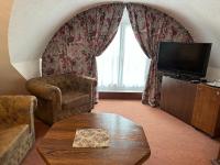 Telewizja i/lub zestaw kina domowego w obiekcie Lesní Hotel Peršlák